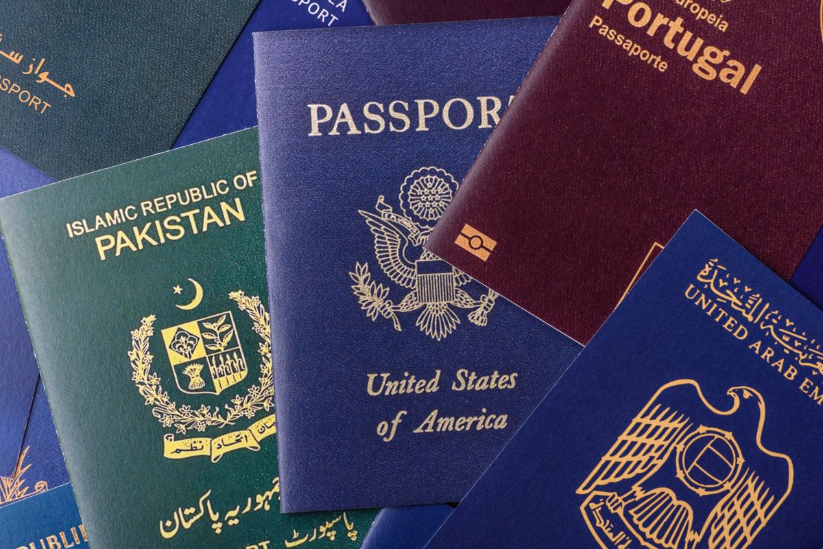 A collection of passports. EU Residency for Gulf Nationals